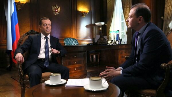 俄总理：俄发展本国经济时会考虑美国制裁的长期持续性 - 俄罗斯卫星通讯社
