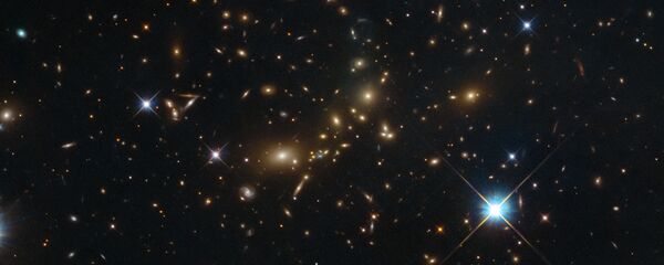 Скопления галактик PLCK G308.3-20.2 в созвездии Райской Птицы, одного из самых крупных объектов в обозримой Вселенной - 俄羅斯衛星通訊社