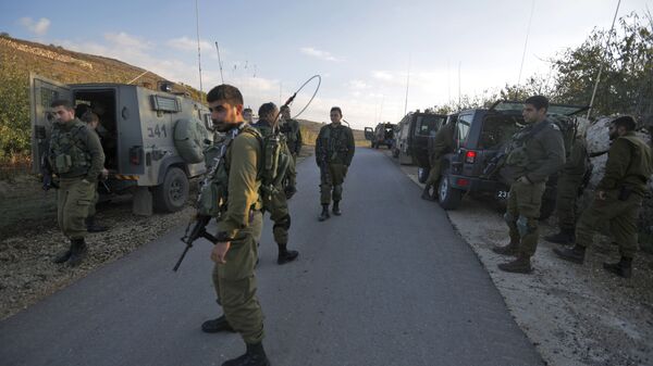 Израильские солдаты в районе Голанских высот на границе с Сирией - 俄罗斯卫星通讯社