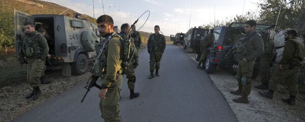 Израильские солдаты в районе Голанских высот на границе с Сирией Израильские солдаты в районе Голанских высот на границе с Сирией - 俄羅斯衛星通訊社