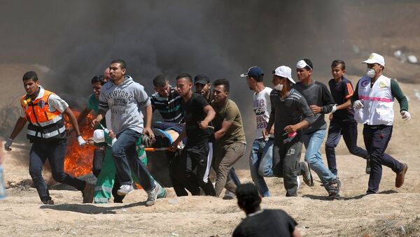 加沙邊境巴以軍民衝突造成18名巴勒斯坦人死亡 逾900人受傷 - 俄羅斯衛星通訊社