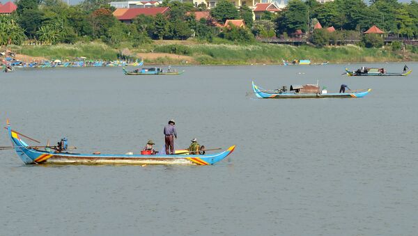 Fishermen pulling their nets in the Mekong river - 俄羅斯衛星通訊社