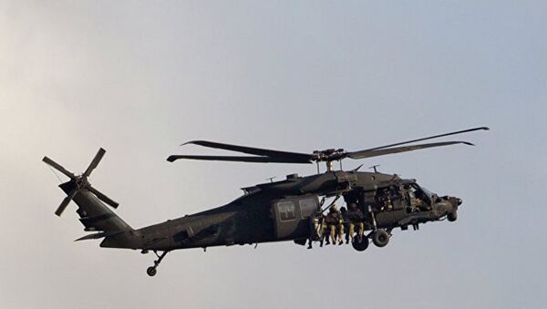美军用直升机所载弹药箱砸中学校屋顶 - 俄罗斯卫星通讯社