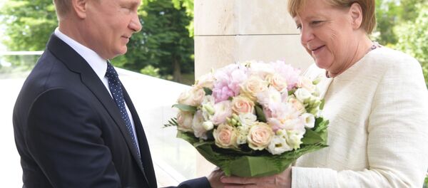 Путин-Меркель - 俄羅斯衛星通訊社