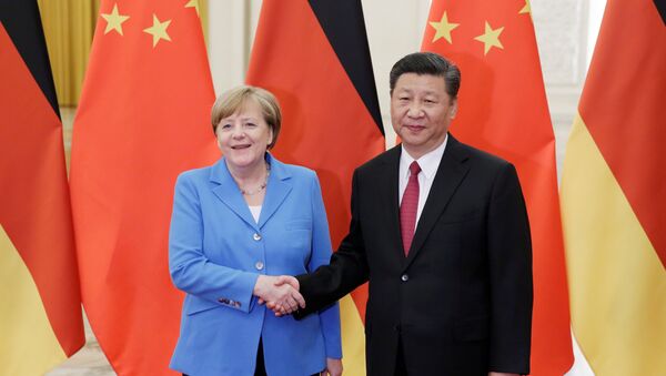 China's President Xi Jinping meets German Chancellor Angela Merkel at the Great Hall of the People in Beijing - 俄罗斯卫星通讯社