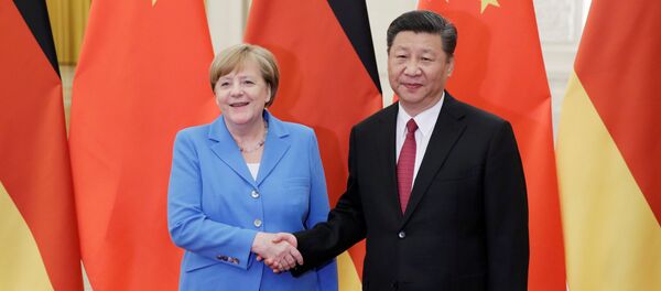 China's President Xi Jinping meets German Chancellor Angela Merkel at the Great Hall of the People in Beijing - 俄罗斯卫星通讯社