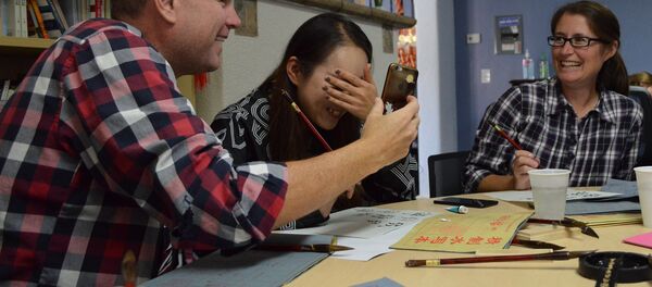Chinese calligraphy taught by members of the Confucius Institute Chinese calligraphy taught by members of the Confucius Institute - 俄罗斯卫星通讯社