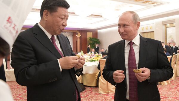 2018年6月8日。俄罗斯总统普京同中国国家主席习近平在天津的隆重招待会上 - 俄罗斯卫星通讯社