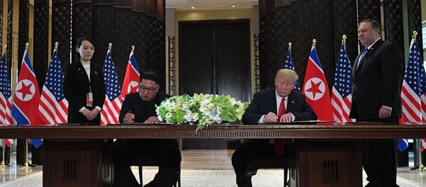 特朗普與金正恩簽署新加坡峰會總結性文件 - 俄羅斯衛星通訊社