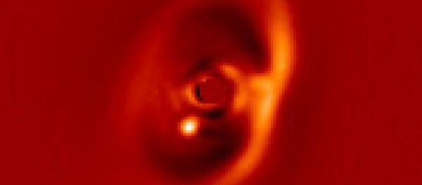 天文學家首次拍到新星球誕生時照片 - 俄羅斯衛星通訊社