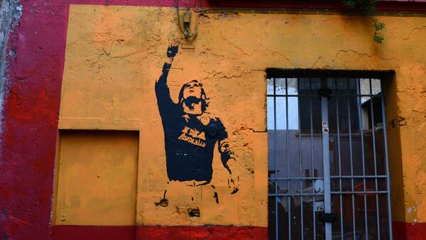 Граффити с изображением футболиста Франческо Тотти в Риме  - 俄罗斯卫星通讯社