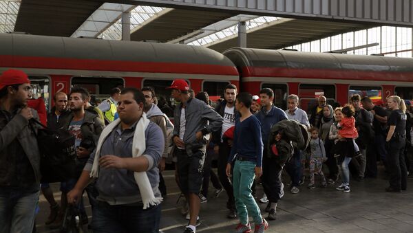 Беженцы из Сирии на центральном железнодорожном вокзале в Мюнхене - 俄羅斯衛星通訊社