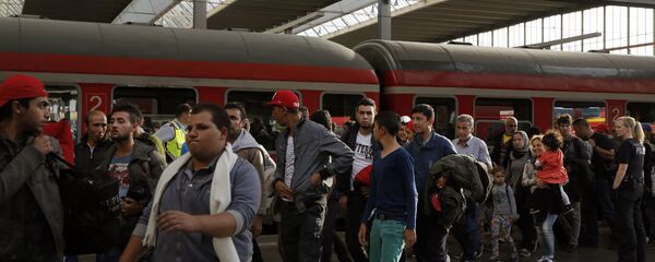 Беженцы из Сирии на центральном железнодорожном вокзале в Мюнхене - 俄羅斯衛星通訊社