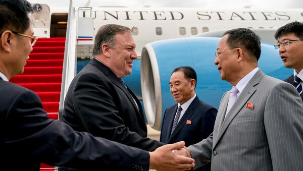 U.S. Secretary of State Mike Pompeo is greeted by North Korean Director of the United Front Department Kim Yong Chol, and North Korean Foreign Minister Ri Yong Ho, as he arrives at Sunan International Airport in Pyongyang - 俄羅斯衛星通訊社