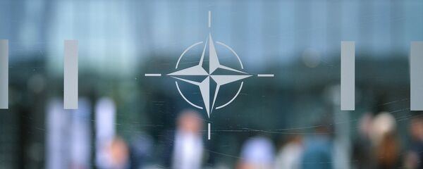 Эмблема НАТО в Брюсселе.  - 俄罗斯卫星通讯社