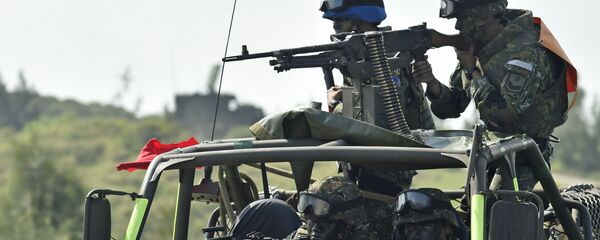 Taiwanese soldiers operate a machine gun - 俄罗斯卫星通讯社