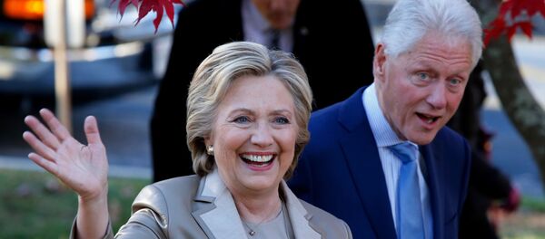 克林顿夫妇 - 俄罗斯卫星通讯社