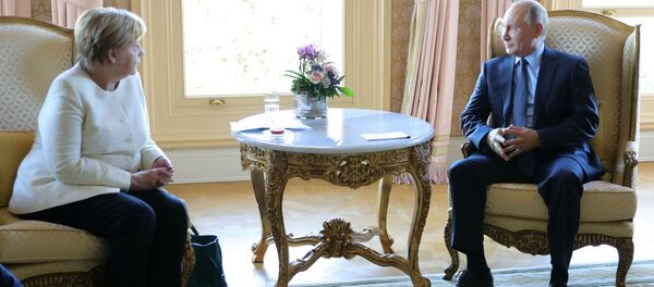 Президент РФ Владимир Путин и канцлер Германии Ангела Меркель во время встречи - 俄羅斯衛星通訊社