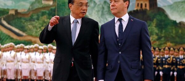 Премьер Госсовета КНР Ли Кэцян и премьер-министр РФ Дмитрий Медведев - 俄罗斯卫星通讯社