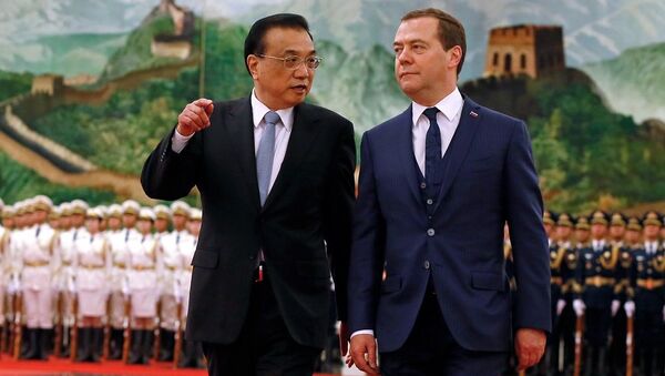 Премьер Госсовета КНР Ли Кэцян и премьер-министр РФ Дмитрий Медведев - 俄羅斯衛星通訊社