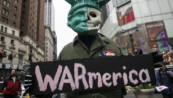 Участник акции протеста против ударов по Сирии в Нью-Йорке - 俄罗斯卫星通讯社