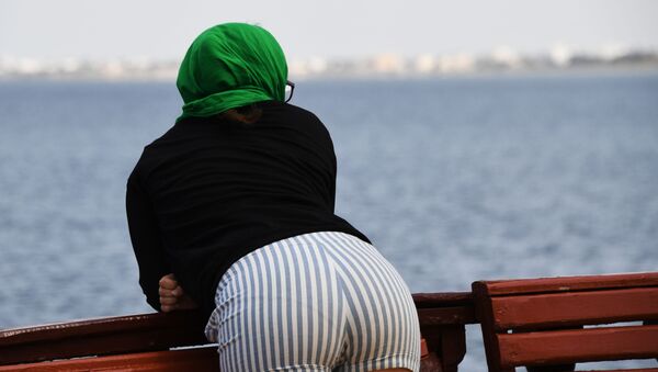 Девушка на набережной острова Джерба в Тунисе - 俄罗斯卫星通讯社