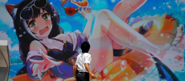 Мужчина смотрит на уличный экран, транслирующий анимацию, в Токио, Япония - 俄罗斯卫星通讯社