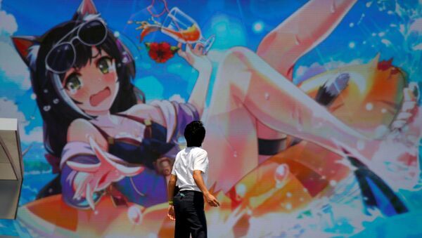 Мужчина смотрит на уличный экран, транслирующий анимацию, в Токио, Япония - 俄罗斯卫星通讯社