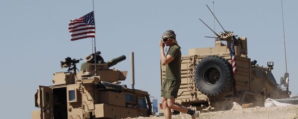 Американские военные на позициях у города Манбидж на севере Сирии - 俄罗斯卫星通讯社