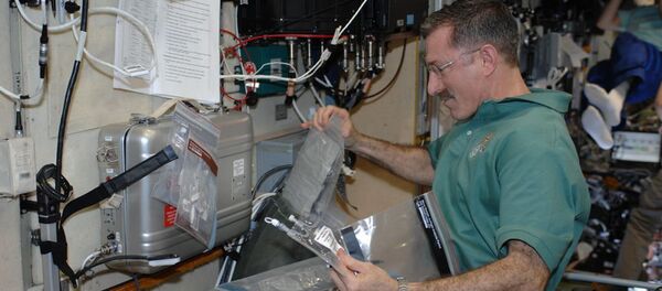 Забор воды на МКС Забор воды на МКС - 俄羅斯衛星通訊社