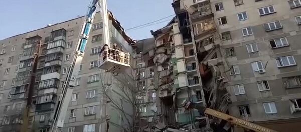 馬格尼托哥爾斯克倒塌房屋的居民爆炸後從窗戶跳下樓 馬格尼托哥爾斯克倒塌房屋的居民爆炸後從窗戶跳下樓 - 俄羅斯衛星通訊社