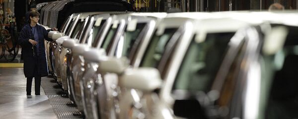 Line worker checks vehicles at the General Motors Hamtramck assembly plant in Hamtramck, Michigan . - 俄罗斯卫星通讯社