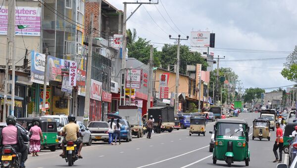 Pallegama-Modarawana Road in downtown Embilipitiya - 俄罗斯卫星通讯社