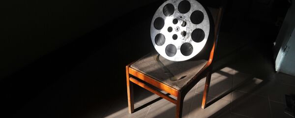 Бабина со старой кинопленкой Бабина со старой кинопленкой - 俄罗斯卫星通讯社