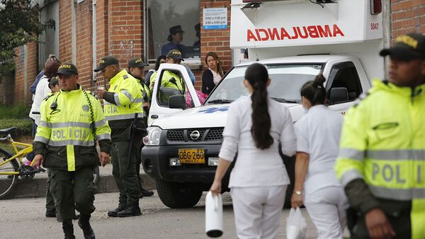 Сотрудники полиции и скорой помощи в Боготе, Колумбия - 俄羅斯衛星通訊社