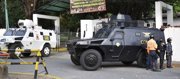 Бронированные машины перед штаб-квартирой Боливарианской национальной гвардии в Каракасе, Венесуэла. 21 января 2019 - 俄罗斯卫星通讯社