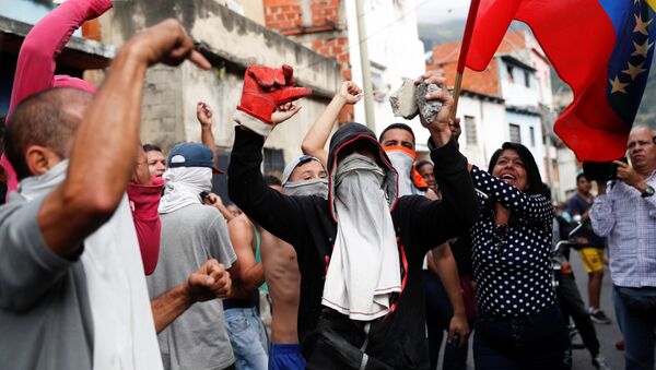 Протестующие в Каракасе, Венесуэла - 俄罗斯卫星通讯社