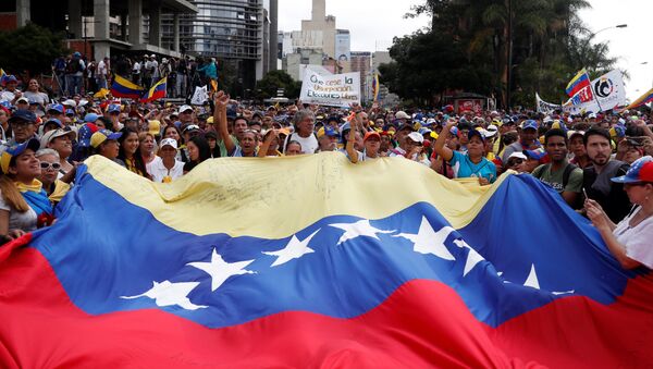 Протестующие против правительства президента Венесуэлы Николаса Мадуро в Каракасе, Венесуэла - 俄罗斯卫星通讯社