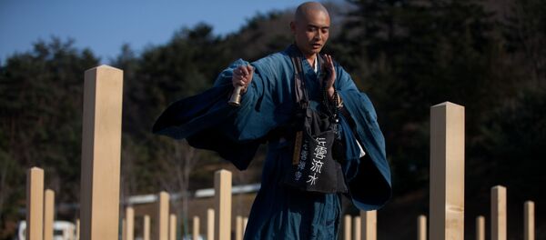 日本警察试以身着袈裟驾车对佛教僧侣罚款 日本警察试以身着袈裟驾车对佛教僧侣罚款 - 俄罗斯卫星通讯社