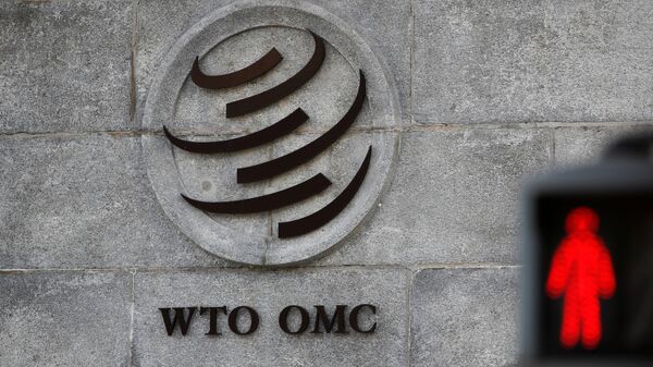 Logo is pictured outside the WTO headquarters in Geneva. - 俄罗斯卫星通讯社