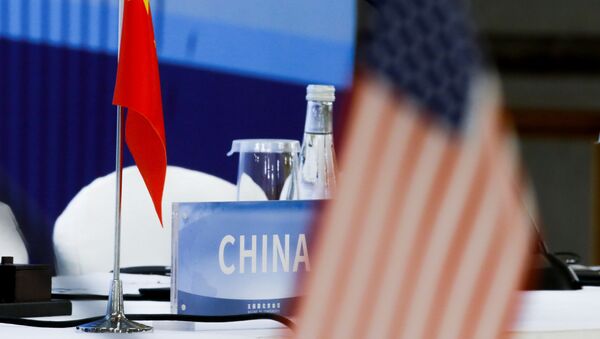 The Chinese and U.S. national flags are seen before the start of a P5 NPT conference in Beijing - 俄羅斯衛星通訊社