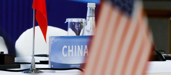 The Chinese and U.S. national flags are seen before the start of a P5 NPT conference in Beijing - 俄羅斯衛星通訊社