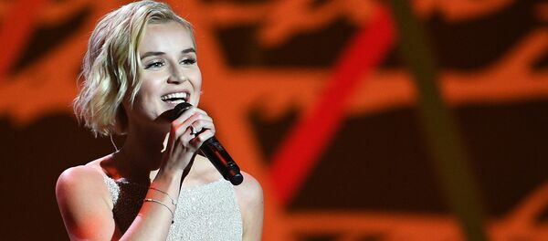 波琳娜•加加林娜 - 俄羅斯衛星通訊社