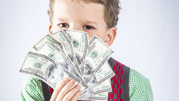 Мальчик с банкнотами долларов - 俄羅斯衛星通訊社