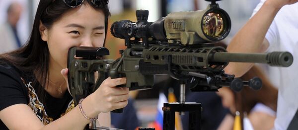 Китаянка со снайперской винтовкой - 俄罗斯卫星通讯社