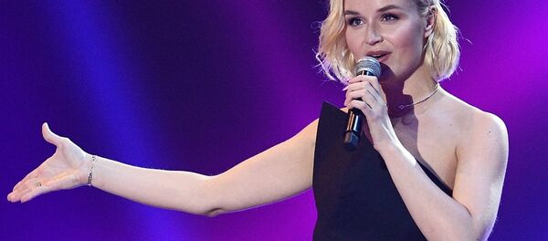 波琳娜•加加林娜 - 俄罗斯卫星通讯社