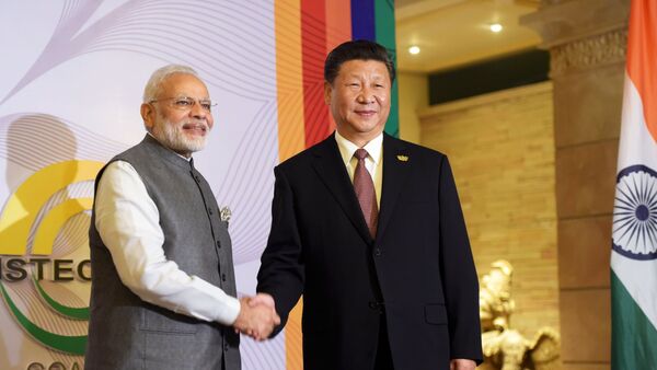 Премьер-министр Индии Нарендра Моди  и председатель КНР Си Цзиньпин - 俄罗斯卫星通讯社