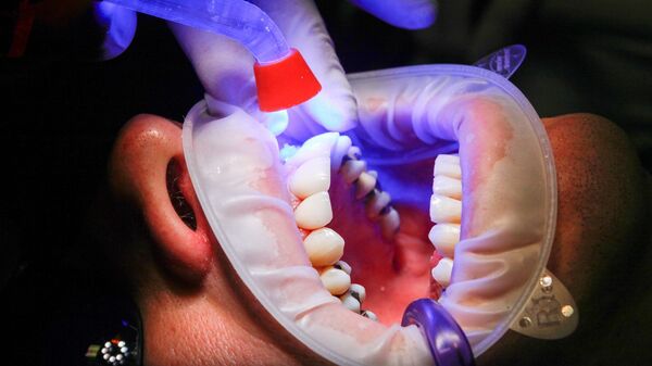 治牙 - 俄羅斯衛星通訊社