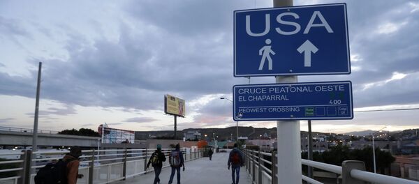 На мексиканско-американской границе - 俄罗斯卫星通讯社