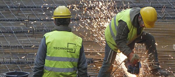 Рабочие на стройке в Варшаве. Архивное фото - 俄罗斯卫星通讯社